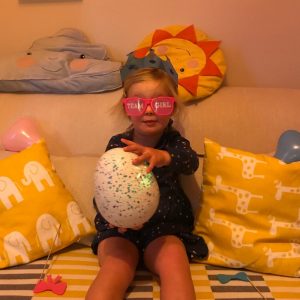 My daughter holding the egg