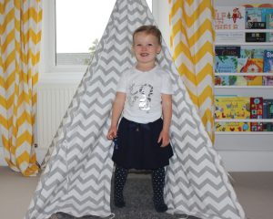 My daughter wearing her clothes from Treasure House