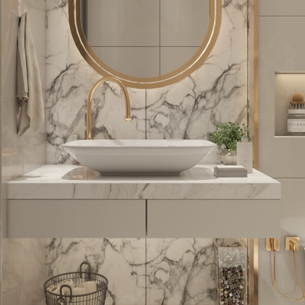 Stunning marble tiled bathroom featuring gold taps and mirror